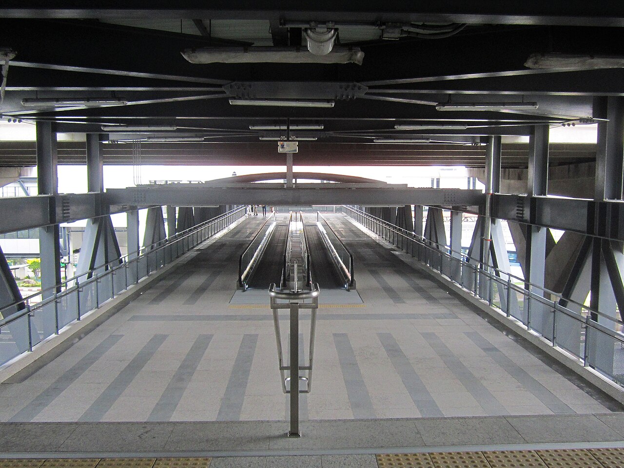 Covered walkway and travelators linking Don Mueang SRT Red Line station to the airport terminal - the 33-baht Thailand budget travel route into Bangkok