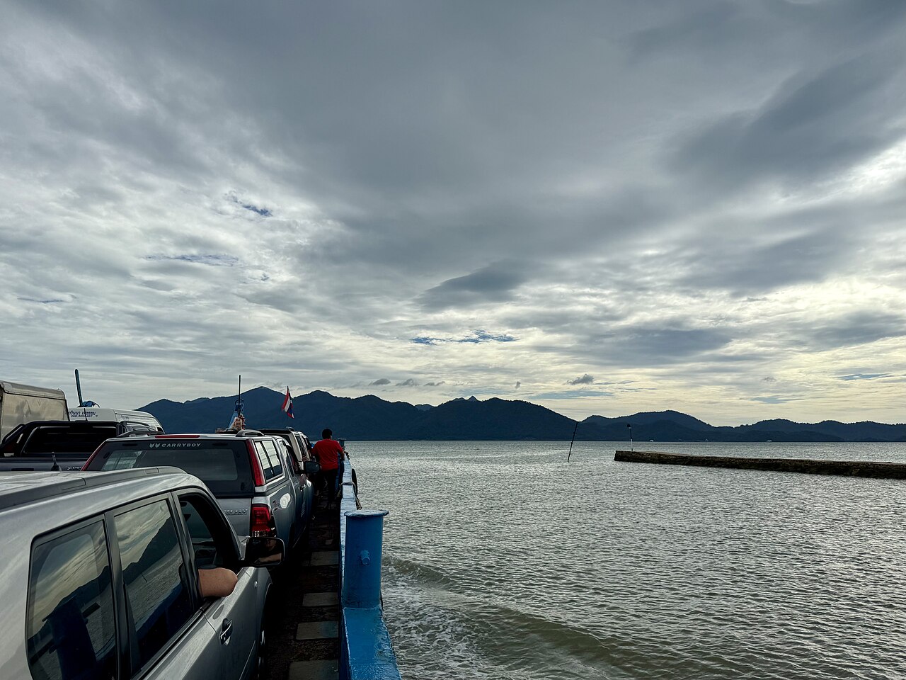 Vehicles queueing on the Koh Chang ferry at the pier in Trat province, Thailand, where a car costs 200 baht and a foot passenger 90 baht in 2026 Thailand travel costs